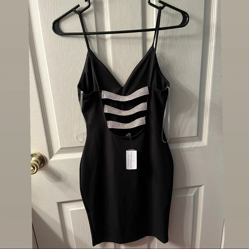 Black dress w/ silver rhinestones on back, size small. - Picture 2 of 2